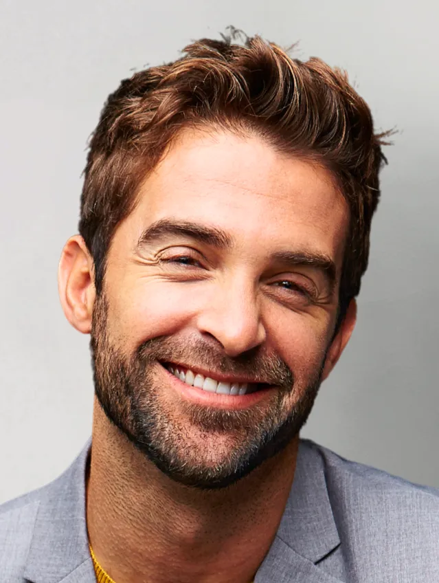 Sophisticated Man Smiling With Cosmetic Bonding