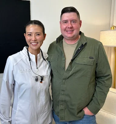 Dr. Grace Jun posing kindly with a patient